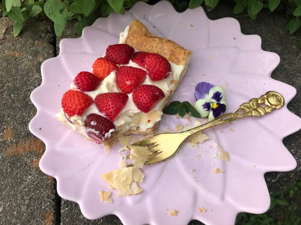 Fresh strawberry tart with puff pastry crust.