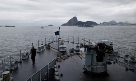 A Brazilian Navy vessel takes part in a security exercise in Guanabara Bay ahead of the 2016 Rio Olympics in Rio de Janeiro, Brazil, July 21, 2016. REUTERS/Ueslei Marcelino