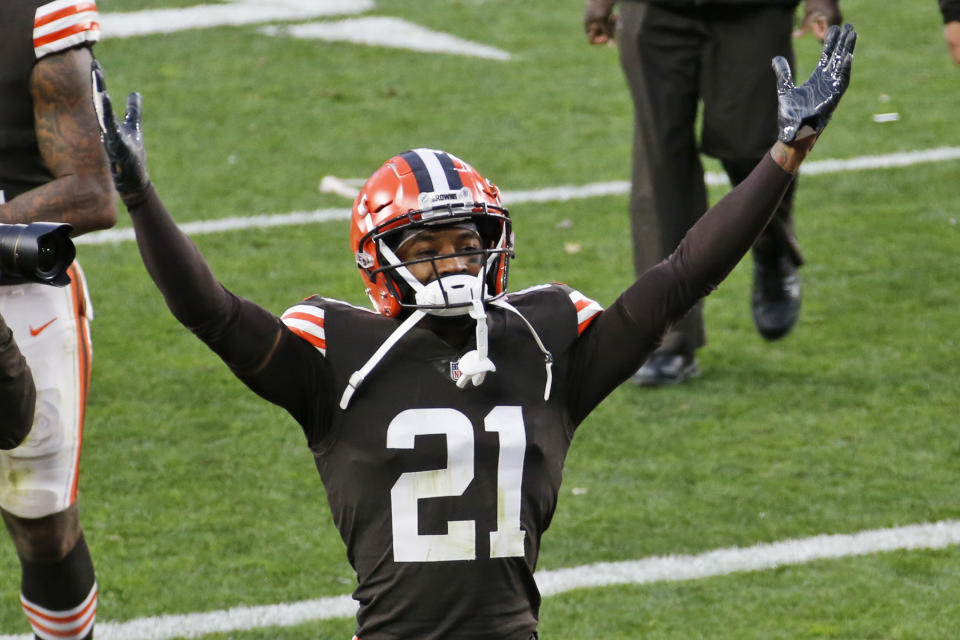 FILE - In this Sunday, Nov. 15, 2020 file photo, Cleveland Browns cornerback Denzel Ward celebrates after the Browns defeated the Houston Texans 10-7 after an NFL football game in Cleveland. The Browns are trying to shake free from COVID-19 to face the Steelers. Cleveland's issues with the virus intensified Thursday, Dec. 31, 2020 as top cornerback Denzel Ward and linebacker Malcolm Smith were placed on the COVID-19 reserve list and the team was forced to close its facility before canceling practice with the biggest game in decades coming fast.(AP Photo/Ron Schwane, File)