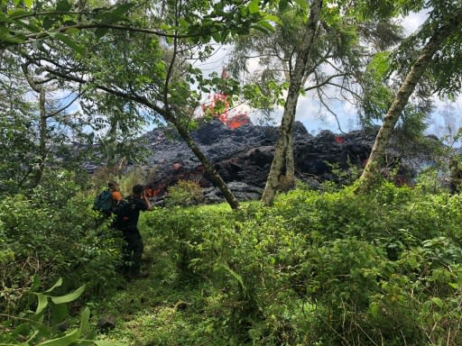 Lava erups from a newly formed fissure in Kapoko on Big Island in Hawaii