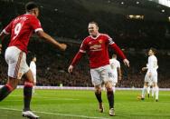 Football Soccer - Manchester United v Swansea City - Barclays Premier League - Old Trafford - 2/1/16 Wayne Rooney celebrates with Anthony Martial after scoring the second goal for Manchester United Reuters / Andrew Yates Livepic