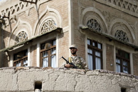 A Houthi militant secures an area where fellow Houthis demonstrated against the Saudi-led air strikes in Yemen's capital Sanaa August 24, 2015. REUTERS/Khaled Abdullah