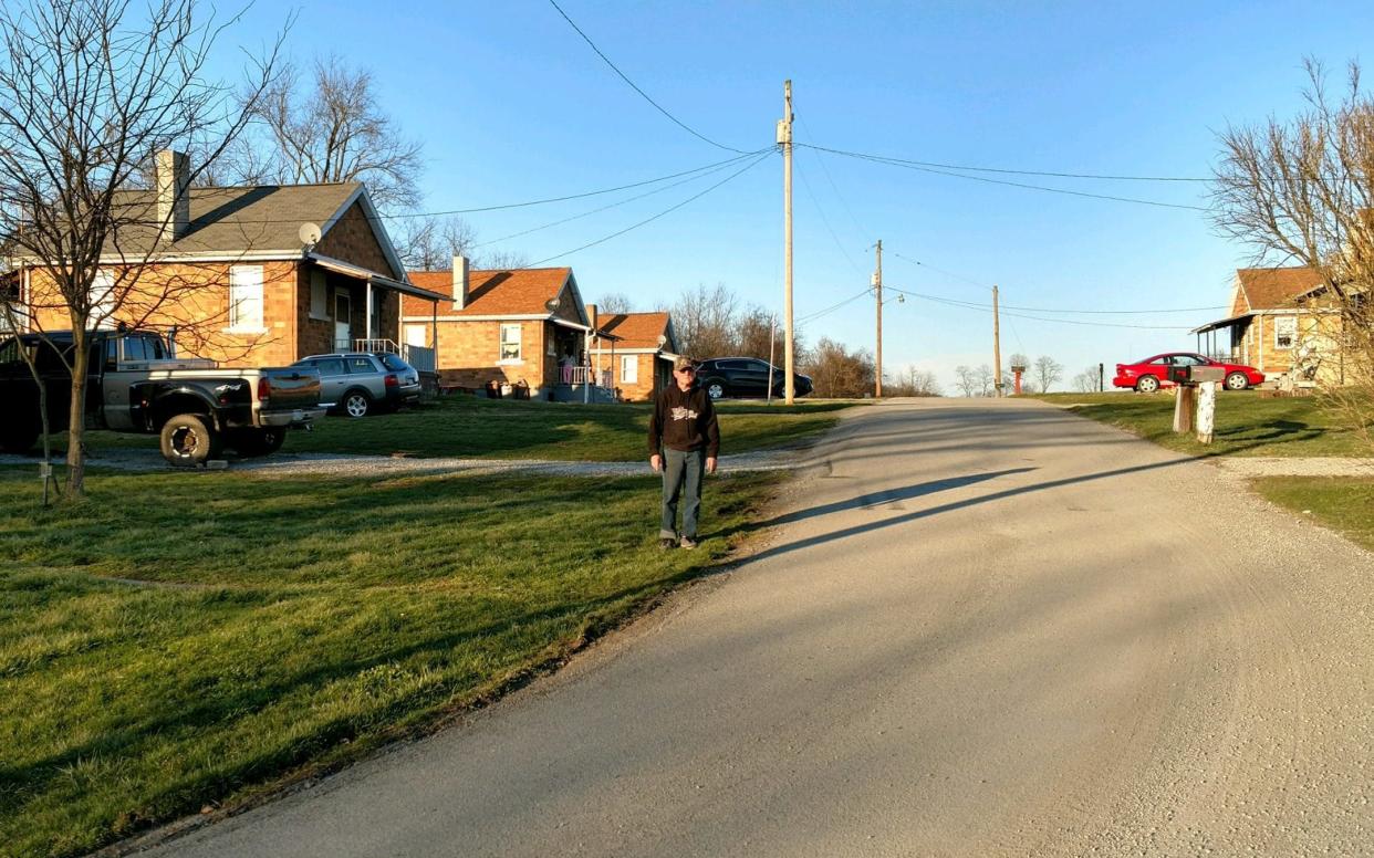 David Stawovy, owner and manager of the town, walks down a street in Reduction, Pennsylvania - REUTERS