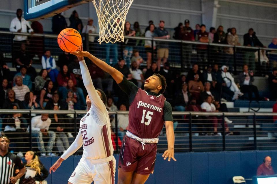 Picayune’s Sanchez Goss gets the ball knocked out of his hands during quarterfinals for Mississippi high school basketball playoffs against Terry at Mississippi Gulf Coast Community College in Perkinston on Friday, Feb. 23, 2024. Hannah Ruhoff/Sun Herald