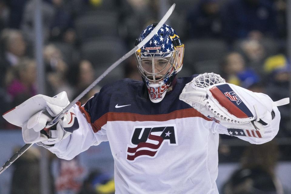 U.S. goaltender Joseph Woll pauses during the second period of a world junior hockey championship game against Slovakia, Wednesday, Dec. 28, 2016, in Toronto. (Chris Young/The Canadian Press via AP)