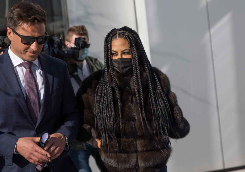 "The Real Housewives of Salt Lake City" star Jen Shah leaves federal court in Salt Lake City, Tuesday, March , 30, 2021. Shah, who is married to an assistant football coach at the University of Utah, faces federal fraud charges in New York. (Spenser Heaps/The Deseret News via AP)