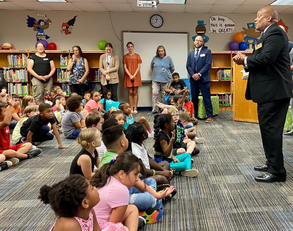 Columbia Public Schools Superintendent Brian Yearwood on Tuesday talks with first- and second-graders at Blue Ridge Elementary School about the importance of reading as part of Read Across Columbia.