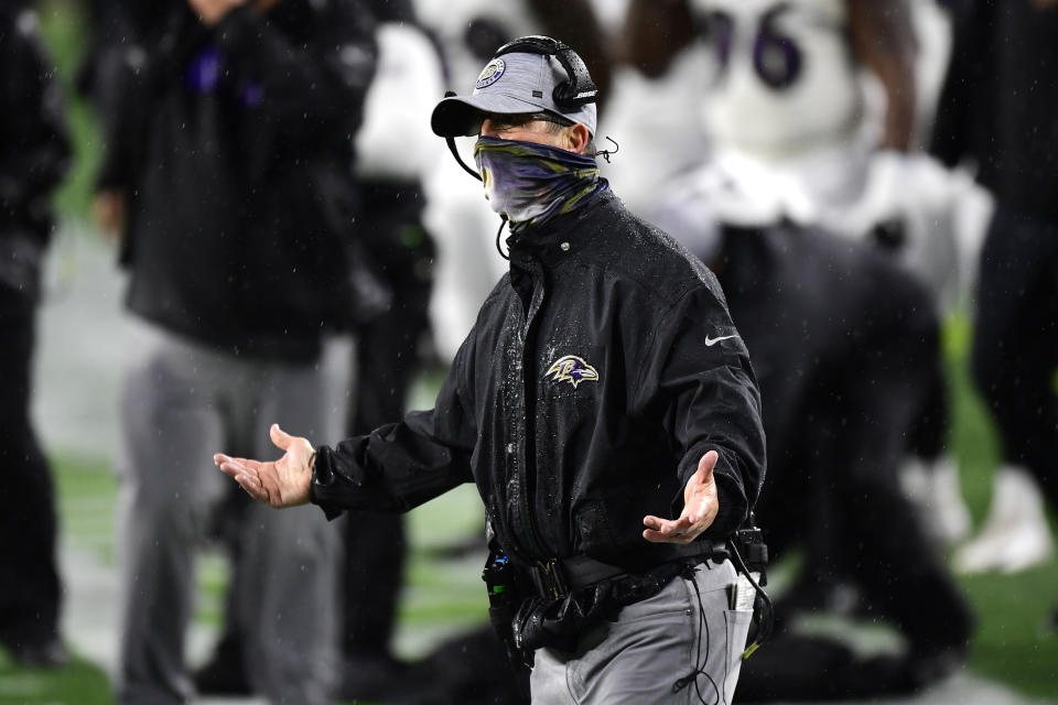 Ravens coach John Harbaugh will have a shorthanded team for Tuesday's game at Pittsburgh. (Photo by Billie Weiss/Getty Images)