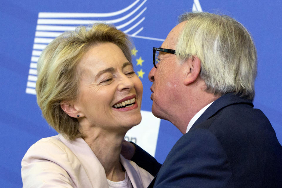 Germany's Ursula von der Leyen is welcomed by European Commission President Jean-Claude Juncker prior to a meeting at EU headquarters in Brussels, Thursday July 4, 2019. European Union leaders have nominated Germany's Ursula von der Leyen to become the next president of the European Commission. (AP Photo/Virginia Mayo)