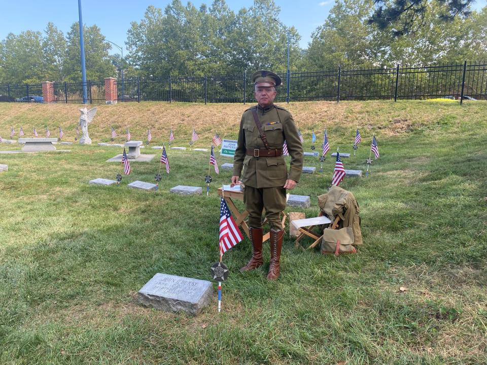 Tom Clegg, a board member for the Iowa Gold Star Military Museum, dressed as a World War I infantry officer for the Woodland Cemetery 175th birthday party Sept. 16, 2023.