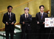 ADDS IDS - Members of South Korean K-pop band BTS, from left, V, Suga and Jin appear at the Sustainable Development Goals meeting during the 76th session of the United Nations General Assembly, at the United Nations Headquarters on Monday, Sept. 20, 2021. (John Angelillo/Pool via AP)