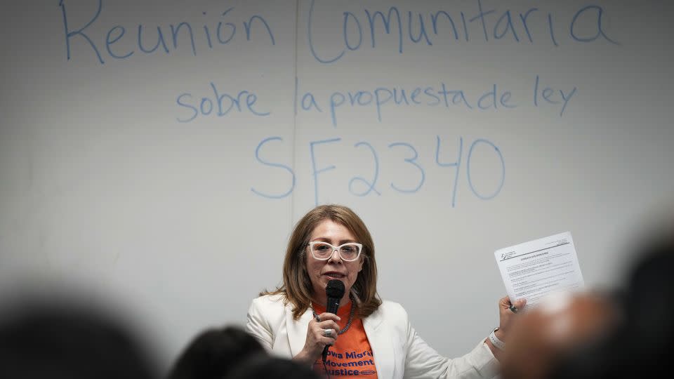 Community organizer Maria Acosta speaks during an Iowa Migrant Movement for Justice informational meeting on March 27 in Des Moines, Iowa. - Charlie Neibergall/AP