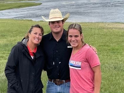 Valerie Hunt poses with mom Cindy and brother Blaine at the Yellowstone River in Wyoming in 2021. Several colleges are interested in giving Valerie a scholarship, including Texas A&M and Oregon.