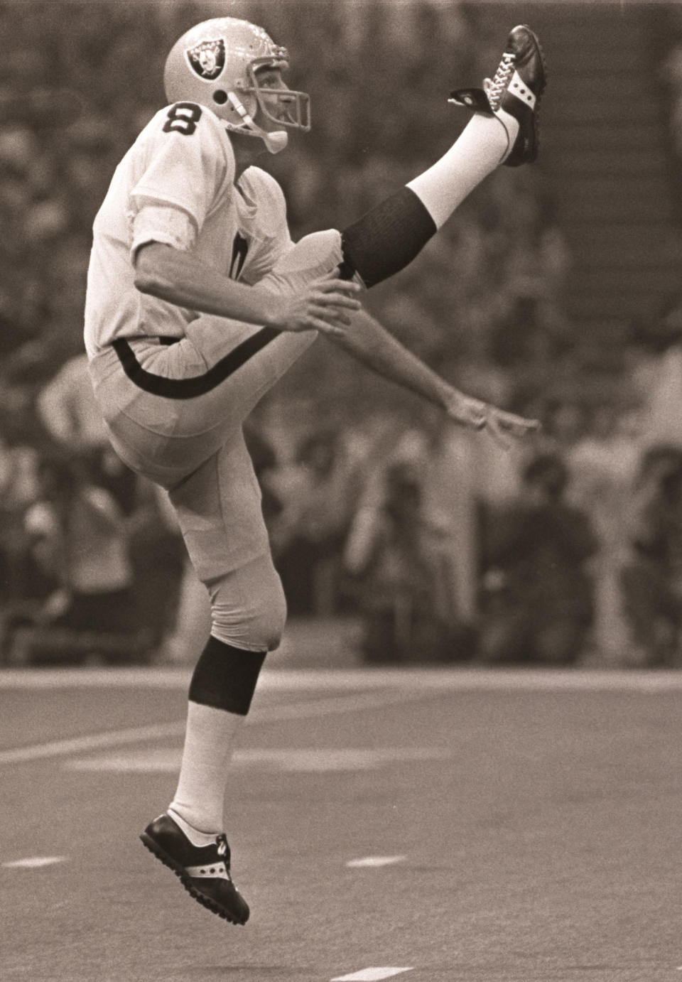 FILE - In this Jan. 25, 1981 file phot, Oakland Raiders punter Ray Guy kicks during the Super Bowl in New Orleans. Guy has become the first punter elected to the Pro Football Hall of Fame on Saturday Feb. 1, 2014. (AP Photo/File)