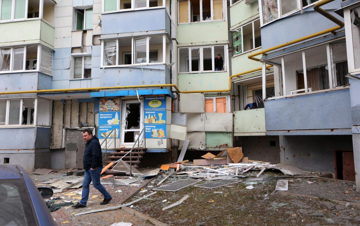 A damaged apartment building in Belgorod, Russia, after aerial attacks