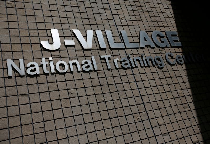 FILE PHOTO: The logo is displayed at the entrance of the main buildng at J-Village in Fukushima Prefecture