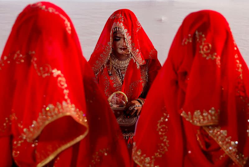 FILE PHOTO: Muslim women are seen during a mass marriage ceremony, in which, 51 Muslim couples took their wedding vows, in Mumbai