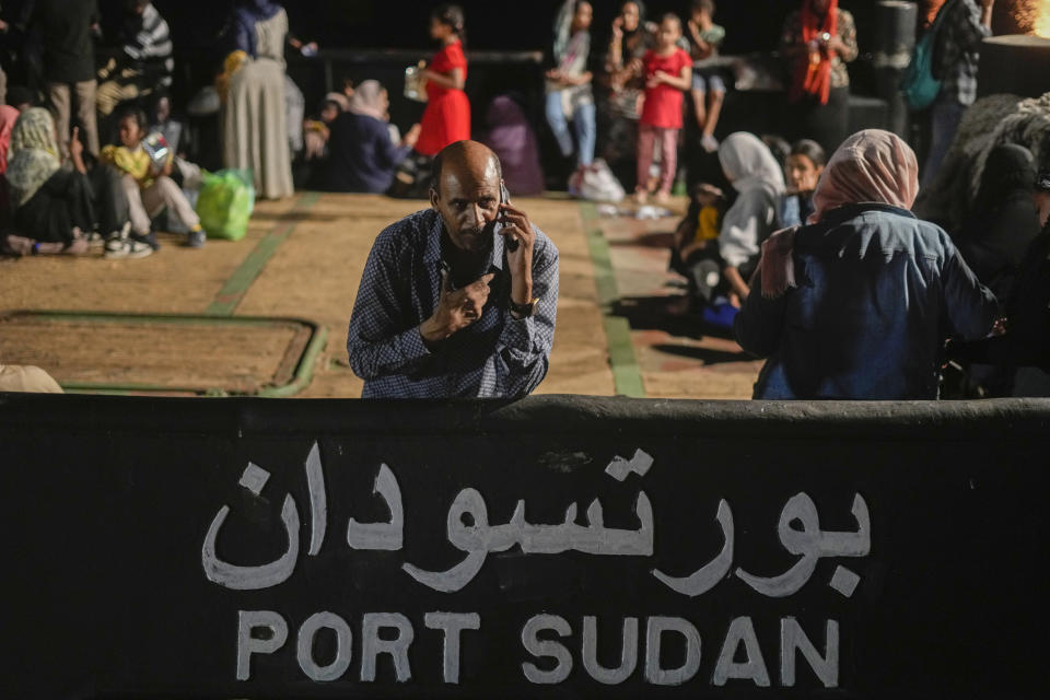 FILE - A Sudanese evacuee waits at Port Sudan before boarding a Saudi military ship to Jeddah port, on May 3, 2023. In the country's capital, Sudan's army and the paramilitary group known as the Rapid Support Forces have battled in the streets with automatic rifles, artillery and airstrikes. An AP journalist, waiting for a chance to leave the country, sheltered with a diverse group of more than a dozen people who hunkered down in a small hotel in central Khartoum. (AP Photo/Amr Nabil, File)