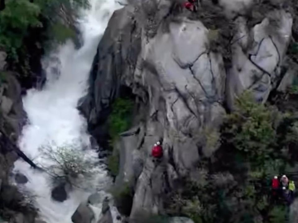 Rescue workers in Utah County, Utah, at Horsetail Falls, where the body of Cynthia Ann Grimwood, 19, was located after she was swept away above the falls on 8 June, 2024 (screengrab/KSL News)