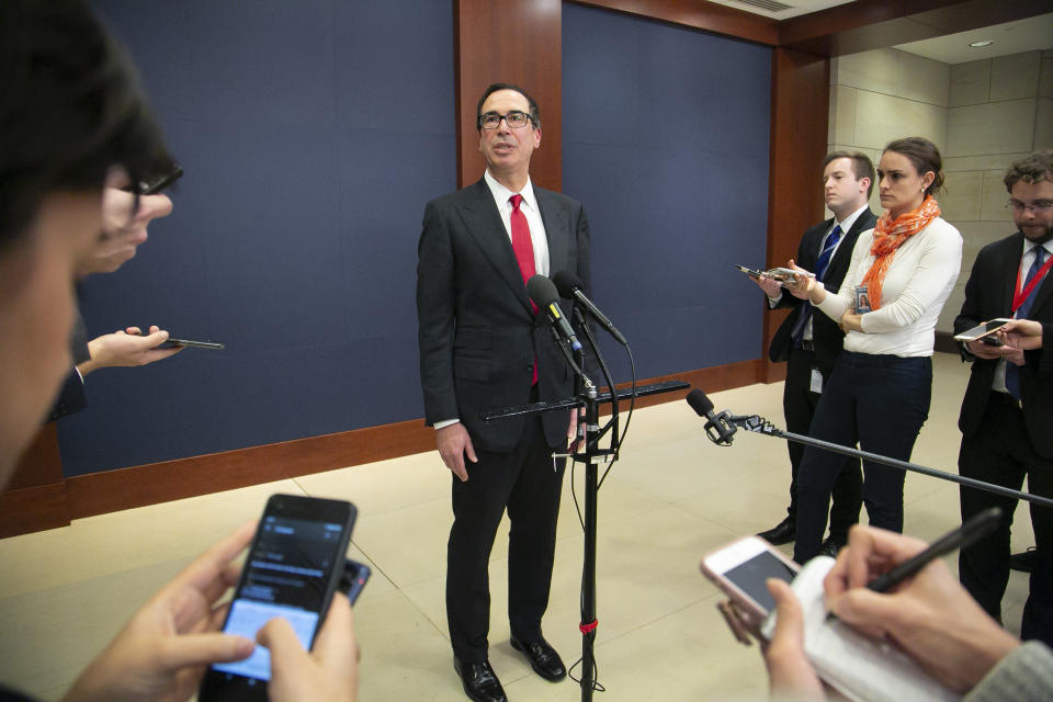 Treasury Secretary Steven Mnuchin speaks to reporters after giving a classified briefing to members of the House of Representatives, telling them that the Trump administration will keep strict U.S. sanctions on the Russian oligarch Oleg Deripaska, on Capitol Hill in Washington, Thursday, Jan. 10, 2019. (AP Photo/J. Scott Applewhite)