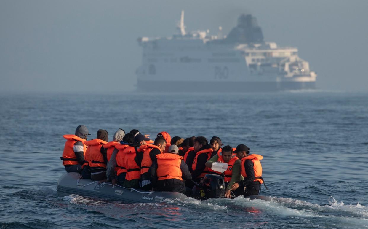Migrants on small boat crossing the Channel