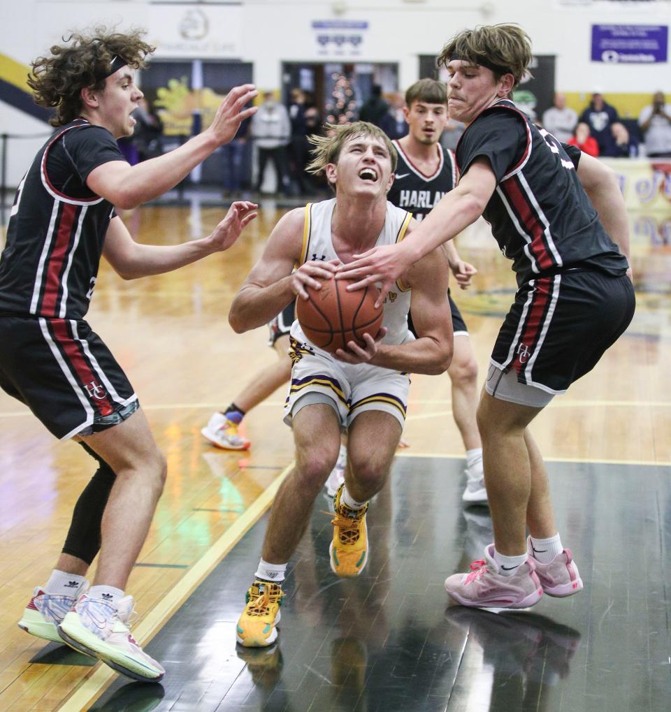 Lyon County's Travis Perry goes for two as Harlan County defends at Saturday's King of the Bluegrass in Fairdale. Dec. 17, 2022 