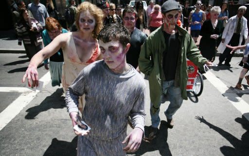 People dressed as zombies march around the streets of San Francisco to promote a new game for the iPhone in May 2012. The US Centers for Disease Control and Prevention (CDC) has declared there was no conclusive evidence for the existence of zombies