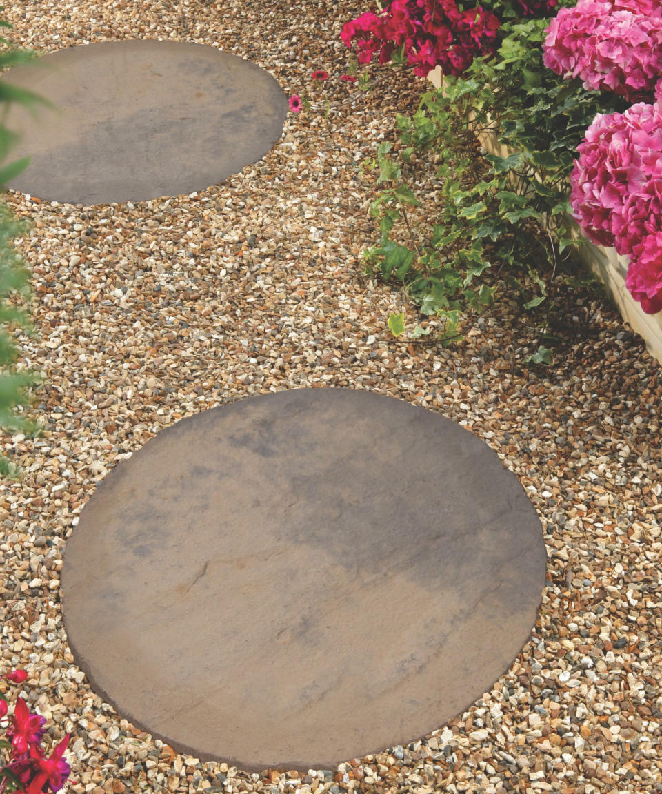 stepping stone path through a gravel garden