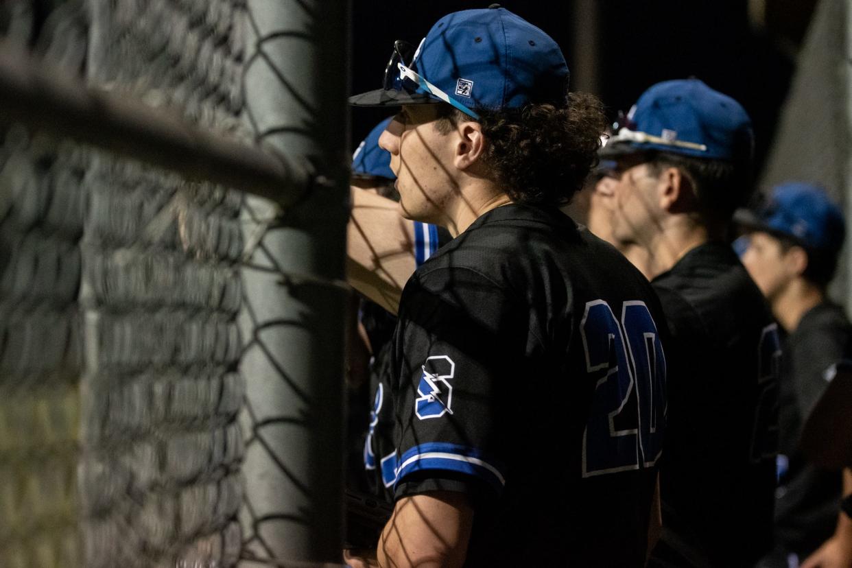 Central Bucks South players watch from the dugout in a Suburban One Colonial Division baseball game against Pennridge, on Tuesday, April 9, 2024, at Central Bucks South in Warrington. The Rams defeated the Titans 5-2.