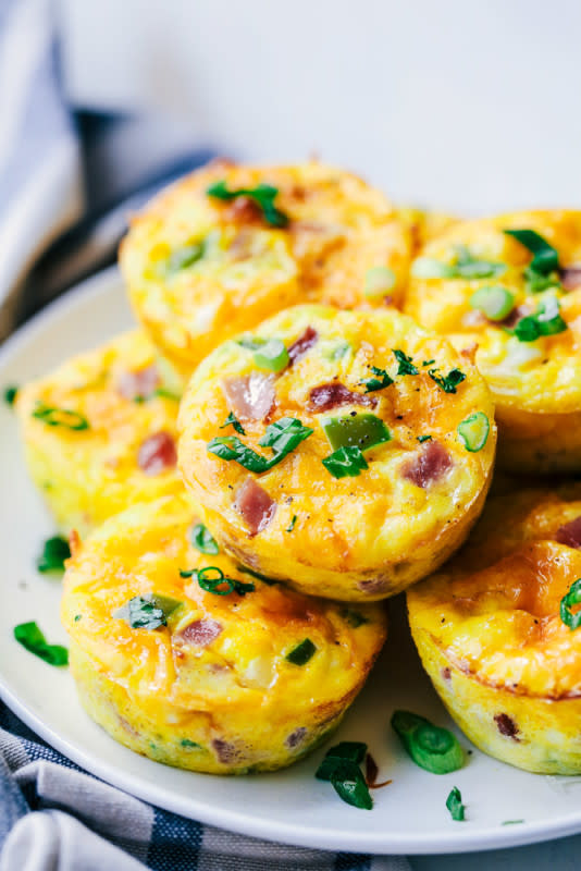 <p>Denver omelet breakfast muffins are such a great breakfast and perfect for making ahead or on the go! Loaded with Peppers, onions, ham and ooey gooey cheese, these will become a favorite!</p><p><a href="http://therecipecritic.com/2017/03/denver-omelet-breakfast-muffins/" rel="nofollow noopener" target="_blank" data-ylk="slk:Get the recipe here!;elm:context_link;itc:0;sec:content-canvas" class="link "><em><strong>Get the recipe here!</strong></em></a></p>