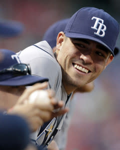 Matt Moore left after seven innings and enjoyed some light moments during a 9-0 rout of the Rangers