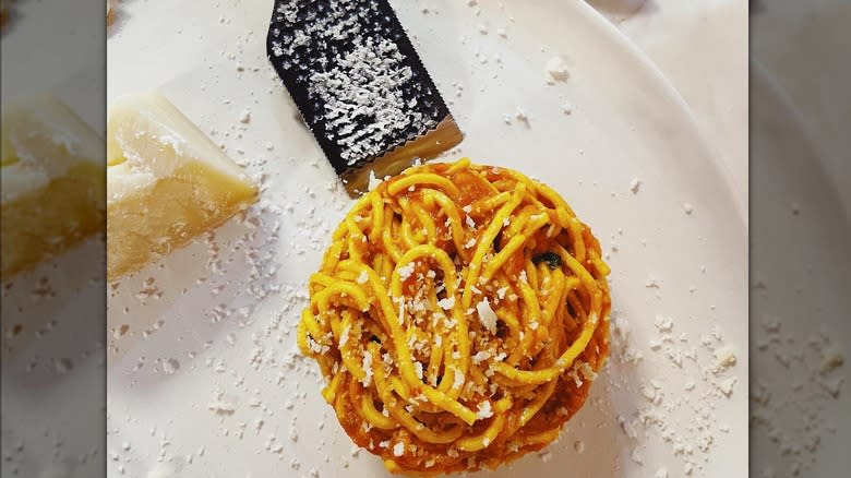 Scarpetta's spaghetti on a white plate
