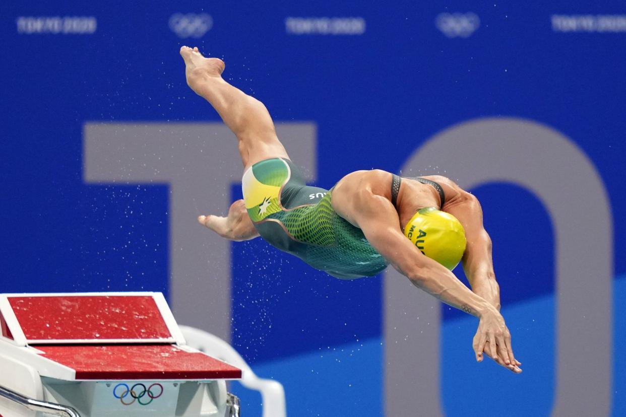 Emma Mckeon, of Australia, dives off the starting block in the women's 50-meter freestyle final at the 2020 Summer Olympics, Sunday, Aug. 1, 2021, in Tokyo, Japan.