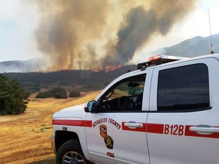 Rose fire burns near Lake Elsinore in Western Riverside County, California, U.S. in this undated photo obtained by Reuters July 31, 2017. Riverside County Fire Department via Facebook/Handout via REUTERS