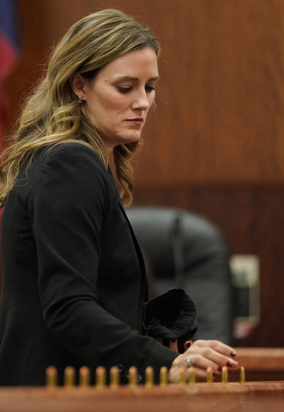 Samantha Knecht, prosecutor, places bullets in front of the jury as she speaks during the sentencing phase for Ronald Lee Haskell Thursday, Oct. 11, 2019 in Houston. A jury has sentenced to death Haskell, who fatally shot six members of his ex-wife&#39;s family in Texas. Jurors on Friday, Oct, 11, 2019, decided Haskell would be a future danger to society and rejected arguments by Haskell&#39;s attorneys that his history of mental illness should spare him the lethal injection. ( Melissa Phillip/Houston Chronicle via AP) (Melissa Phillip/Houston Chronicle via AP)