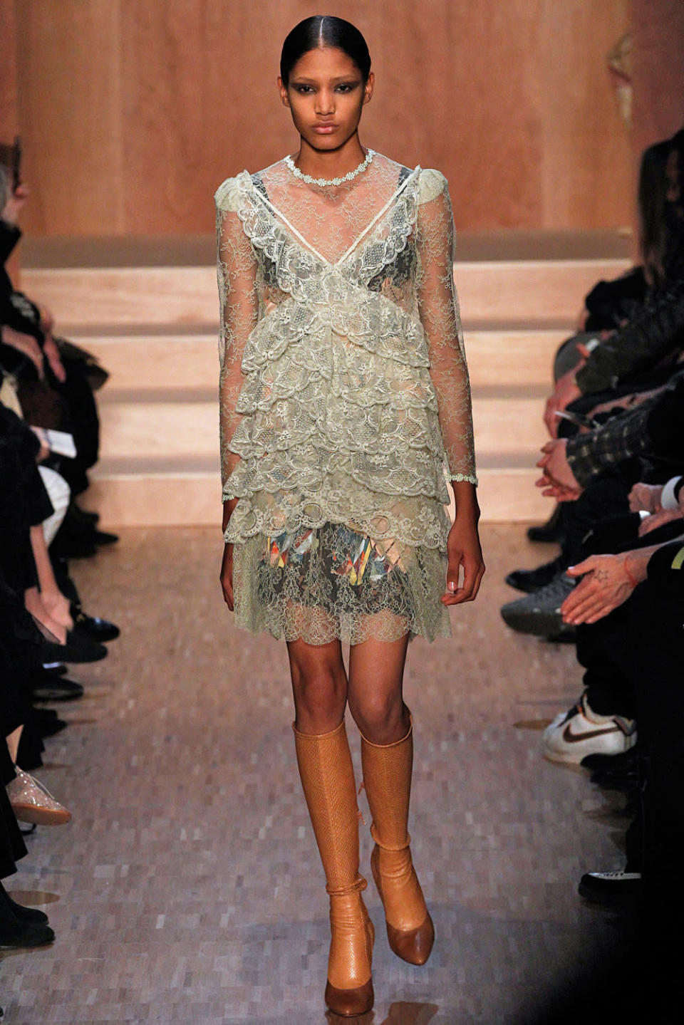 A see through lace ruffle dress from Givenchy is sexy without being vulgar. (Photo by Victor VIRGILE/Gamma-Rapho via Getty Images)