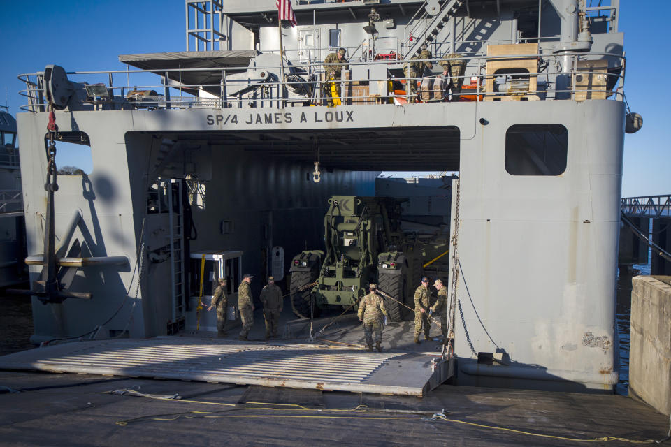 Soldiers from 7th Transportation Brigade (Expeditionary), 3rd Expeditionary Sustainment Command, make final preparations on LSV SP/4 James A. Loux before deploying to the Gaza Strip on Tuesday, March 12, 2024, at Joint Base Langley-Eustis in Hampton, Va. The Loux will be supporting the construction of a floating pier off the coast of Gaza for delivery of humanitarian aid. (AP Photo/John C. Clark)