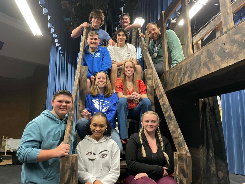 Musical theater director Seth Tinsley (top right) is all smiles with several “Oliver!” cast members at Karns High School, April 23, 2024.