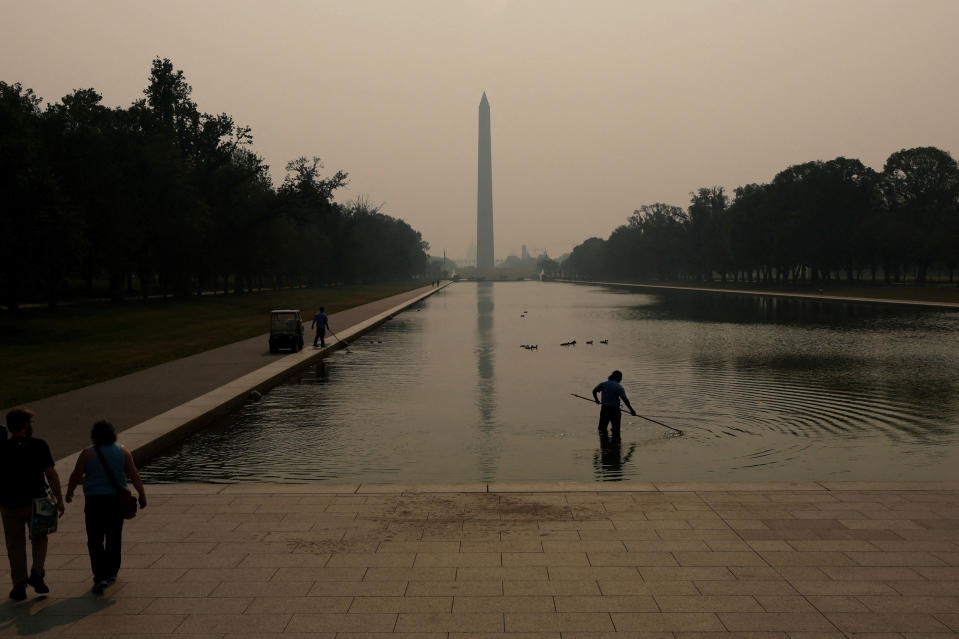 Smoke from wildfires in Canada blankets the Lincoln Memorial Reflecting Pool and the National Mall in Washington, D.C., on June 7, 2023.<span class="copyright">Leah Millis—Reuters</span>