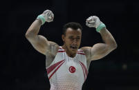 Turkey's Adem Asil reacts after competing in the rings finals during the Artistic Gymnastics World Championships at M&S Bank Arena in Liverpool, England, Saturday, Nov. 5, 2022. (AP Photo/Thanassis Stavrakis)