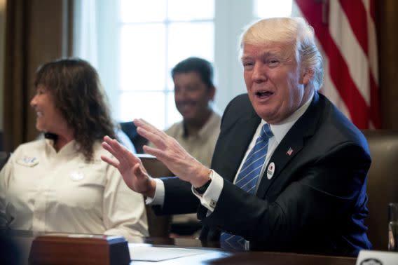 President Donald Trump meets with truckers and industry CEOs regarding health care on March 23 in the White House. (Photo: Andrew Harnik/AP)