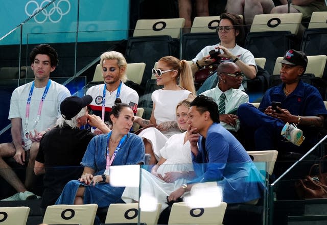 Ariana Grande, wearing sunglasses. at the gymnastics in Paris. 