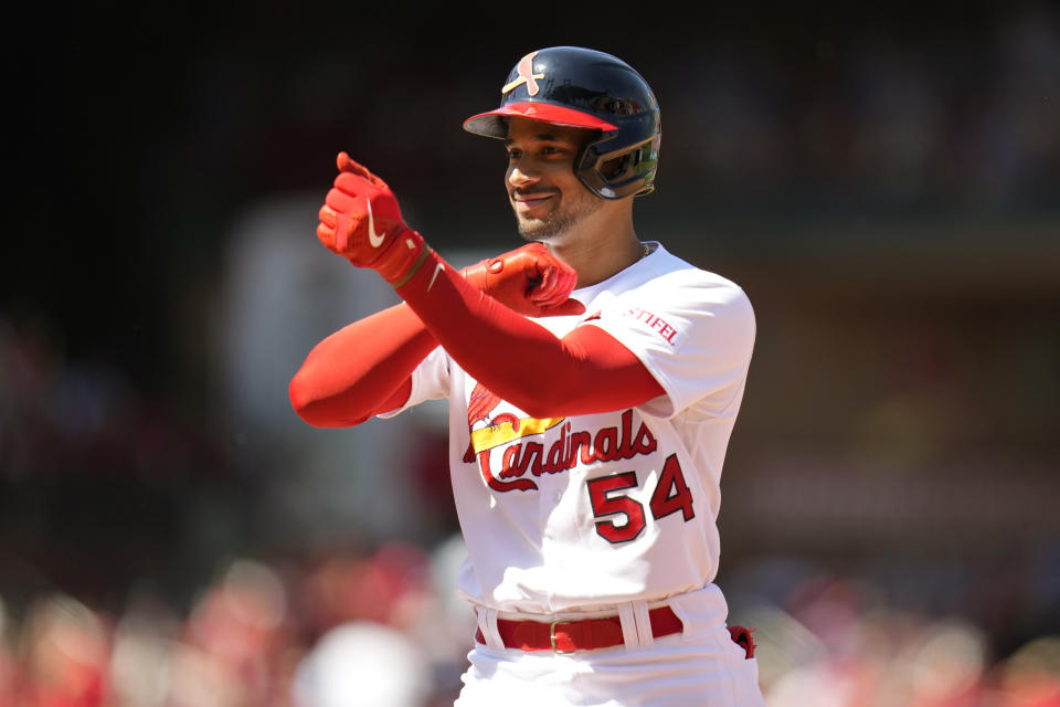 St. Louis Cardinals' Oscar Mercado celebrates hitting a two-run single during the fifth inning of a baseball game against the Los Angeles Dodgers Sunday, May 21, 2023, in St. Louis. (AP Photo/Jeff Roberson)