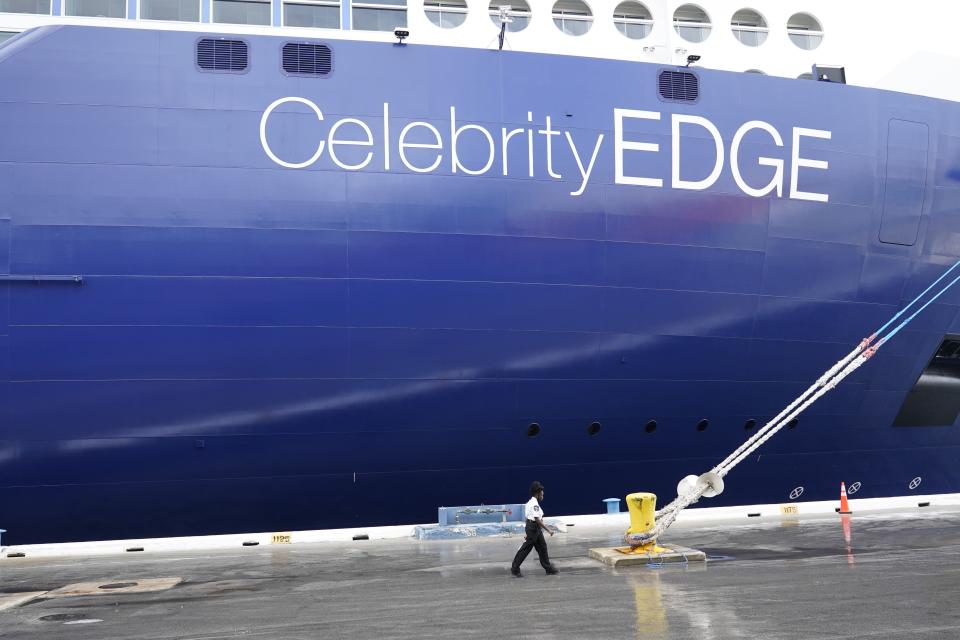 In this Saturday, June 26, 2021 photo. The Celebrity Edge is moored at Port Everglades, in Fort Lauderdale, Fla. Cruise companies are adapting to a changing landscape amid a rise in COVID-19 cases that is threatening to dampen the industry’s comeback.(AP Photo/Marta Lavandier)
