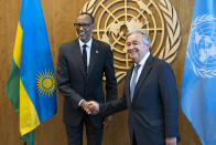Rwanda's President Paul Kagame, left, is greeted by United Nations Secretary-General Antonio Guterres, Monday, Sept. 24, 2018, at U.N. headquarters. (AP Photo/Craig Ruttle)