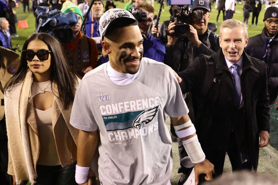 bry burrows and jalen hurts walk off the field after the philadelphia eagles defeat the san francisco 49ers in the nfc championship game