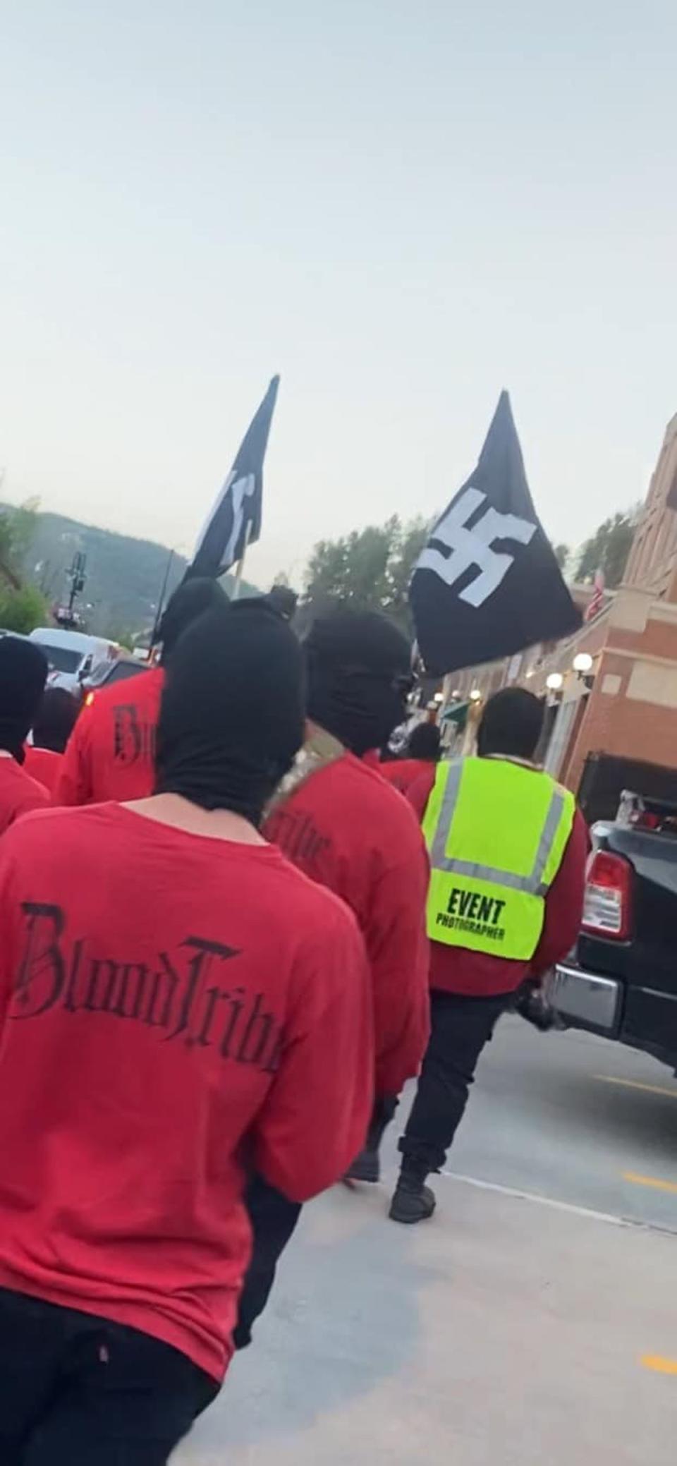 A neo-Nazi group displayed a Nazi flag on the steps of South Dakota’s state capitol as they held rallies in the state. (Rich Sattgast/Facebook)