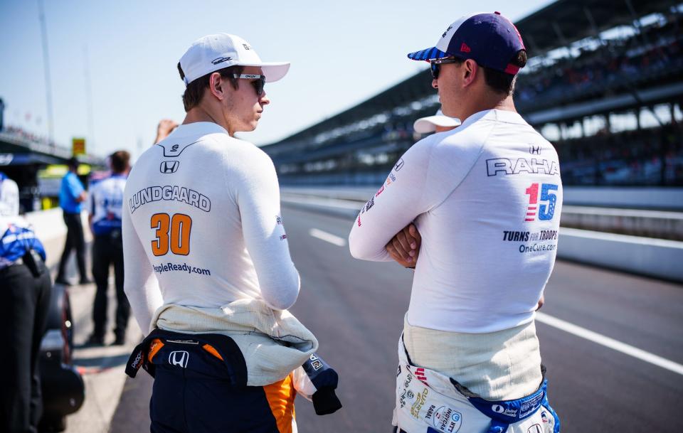 Rahal Letterman Lanigan Racing drivers Christian Lundgaard (30) and Graham Rahal (15) chat Friday, May 20, 2022, during Fast Friday in preparation for the 106th running of the Indianapolis 500 at Indianapolis Motor Speedway.