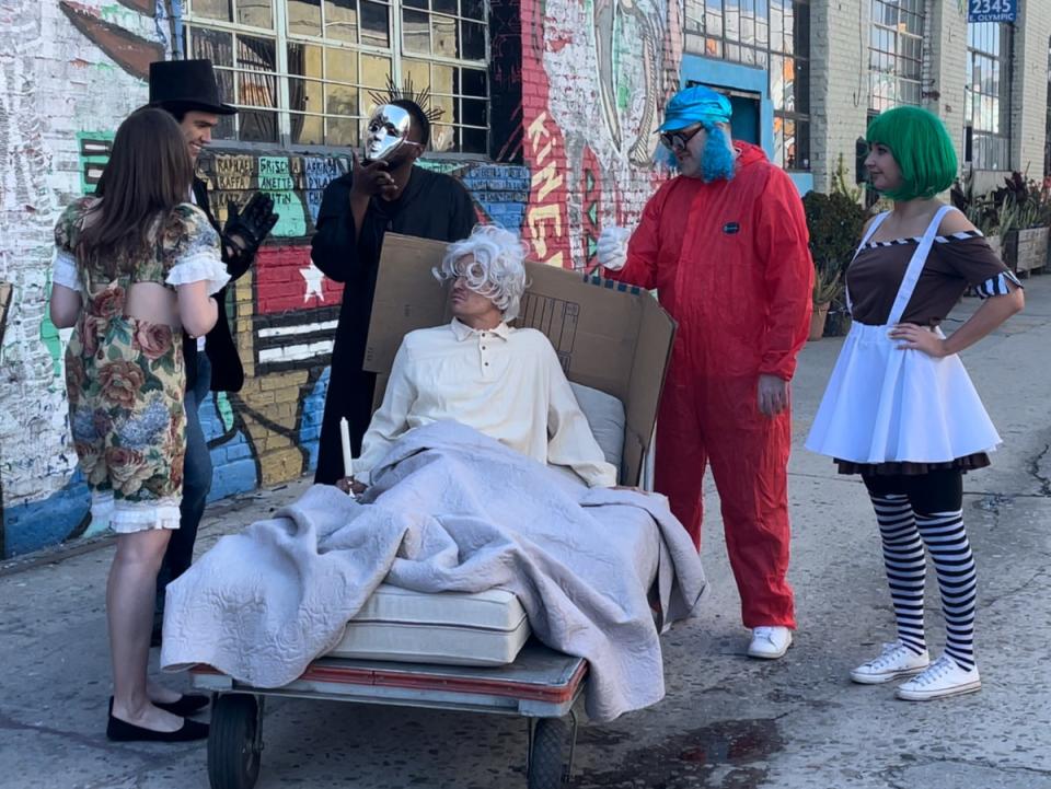 AI-Generated and Roal Dahl characters gathered together for an improvised performance at the Willy Wonka Experience in Downtown Los Angeles, California on 28 April. (Olivia Hebert)