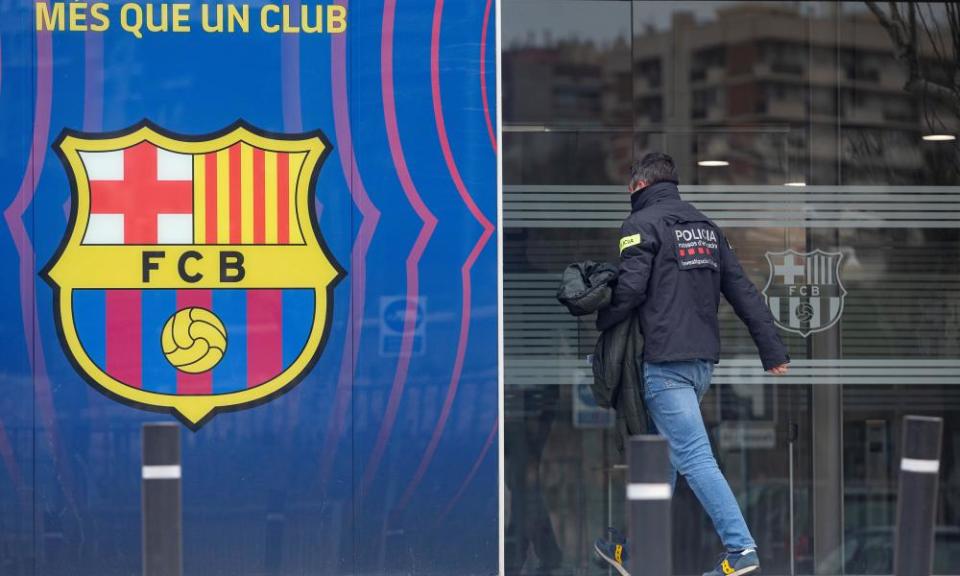 A police officer arrives at Barcelona’s HQ.